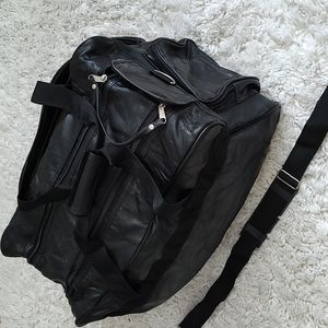 Black leather duffle bag